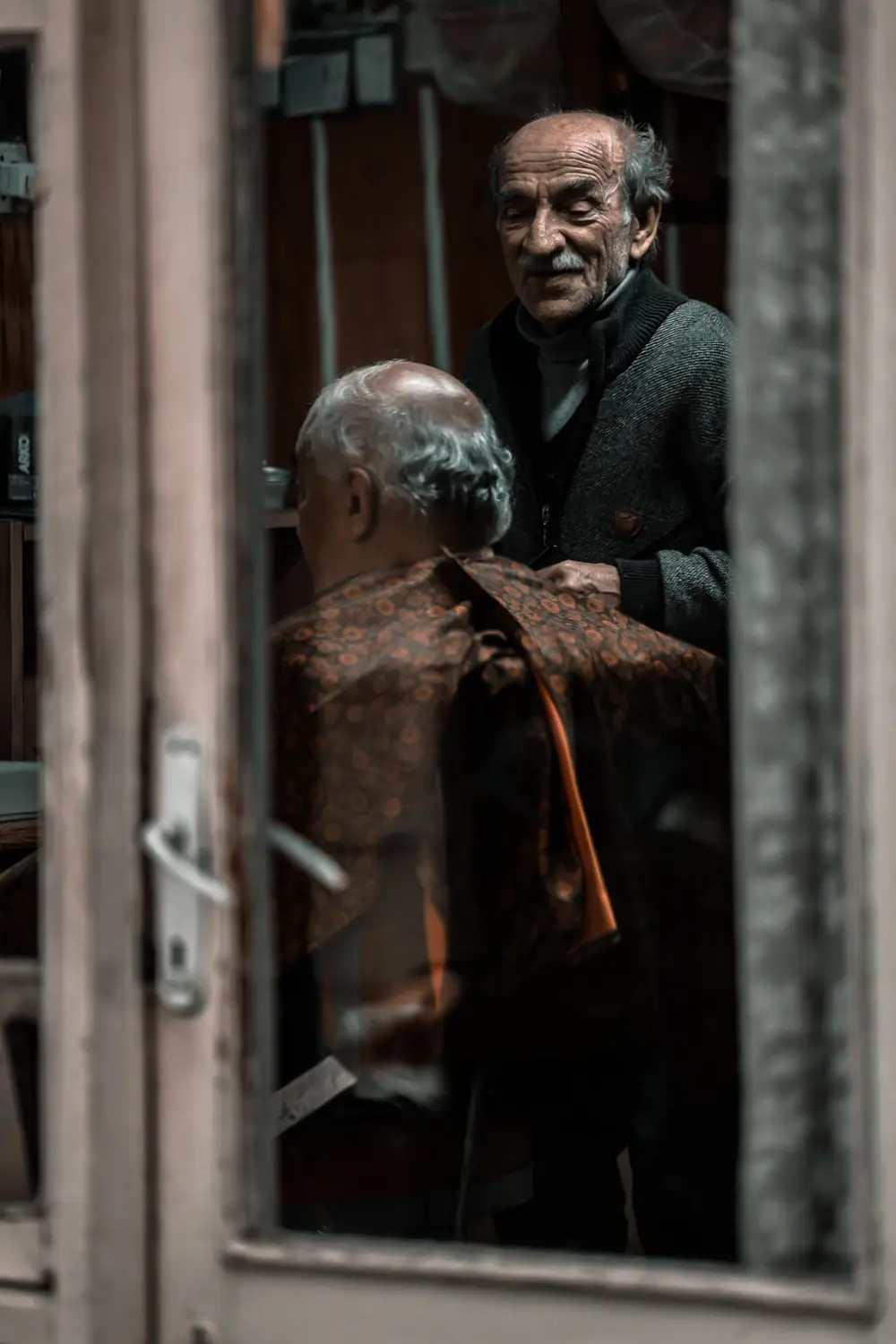 Barber at work in a vintage shop