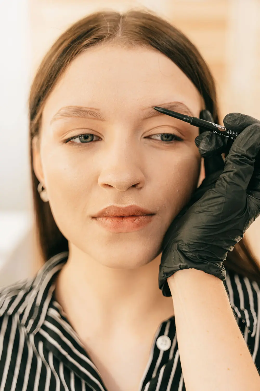 Client relaxing after a brow appointment