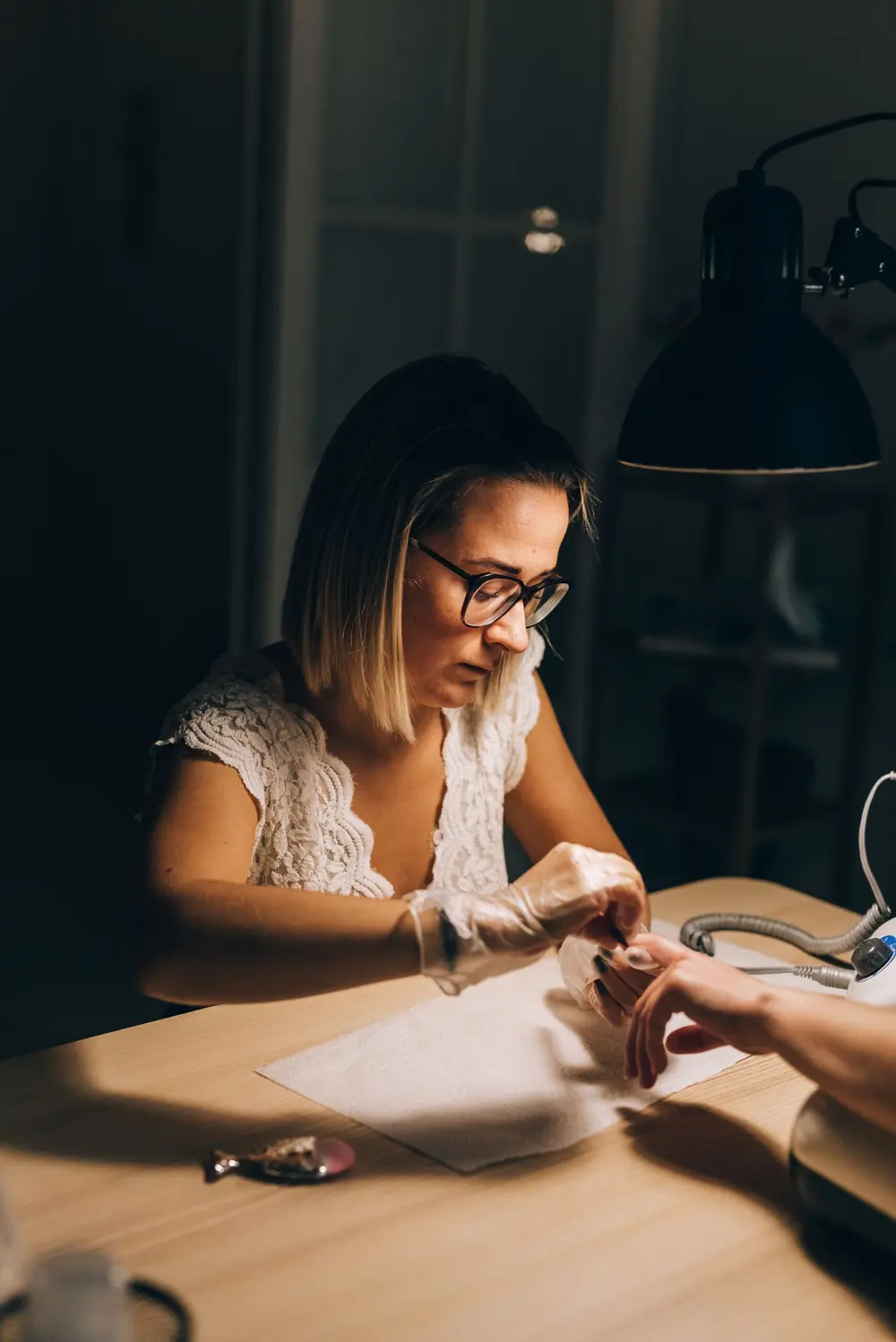 Nail technician giving a manicure