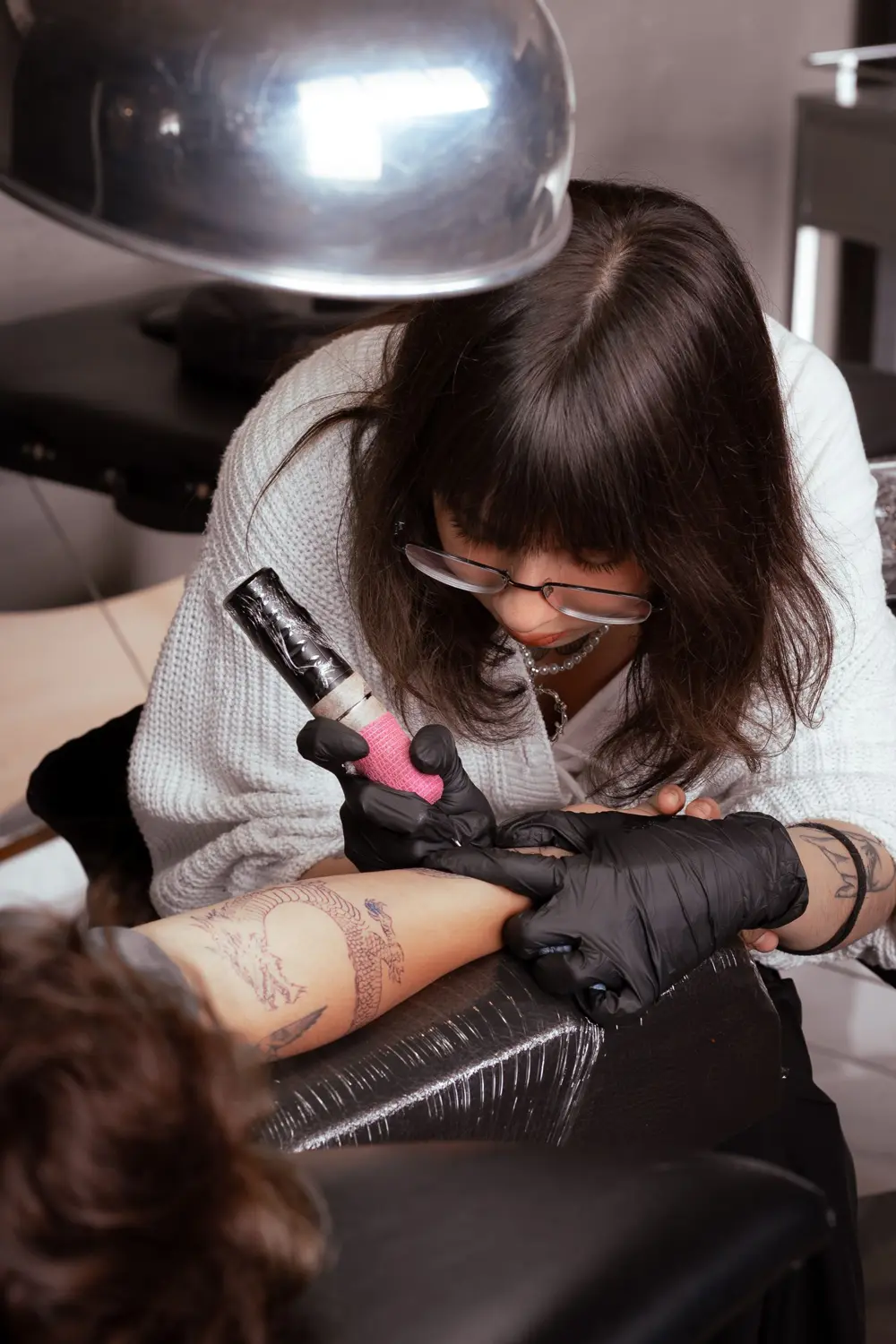 Tattoo artist at work
